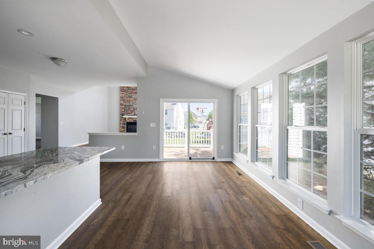 12 Glenbrook Road Ranson, WV 25438 - Photo 14 of 35 a view of empty room with wooden floor and fan