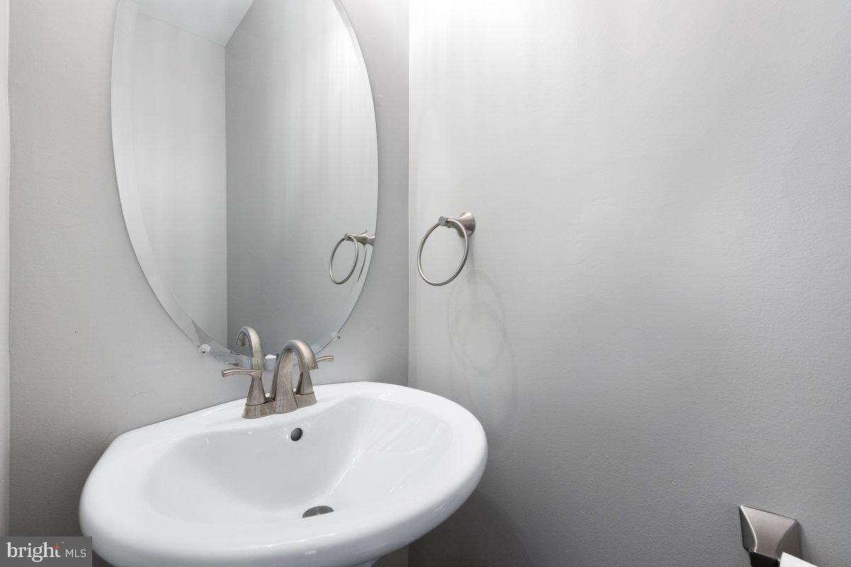 12 Glenbrook Road Ranson, WV 25438 - Photo 17 of 35 a bathroom with a sink and mirror