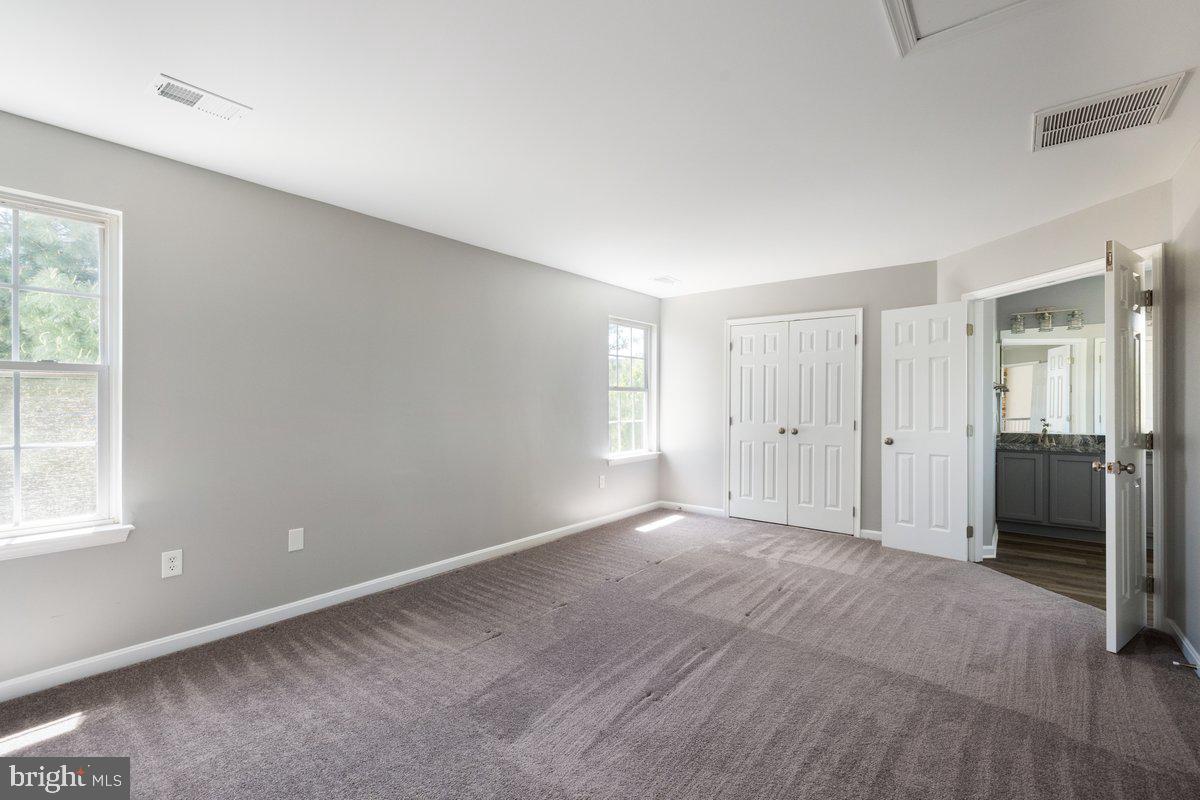 12 Glenbrook Road Ranson, WV 25438 - Photo 18 of 35 a view of an empty room with a window