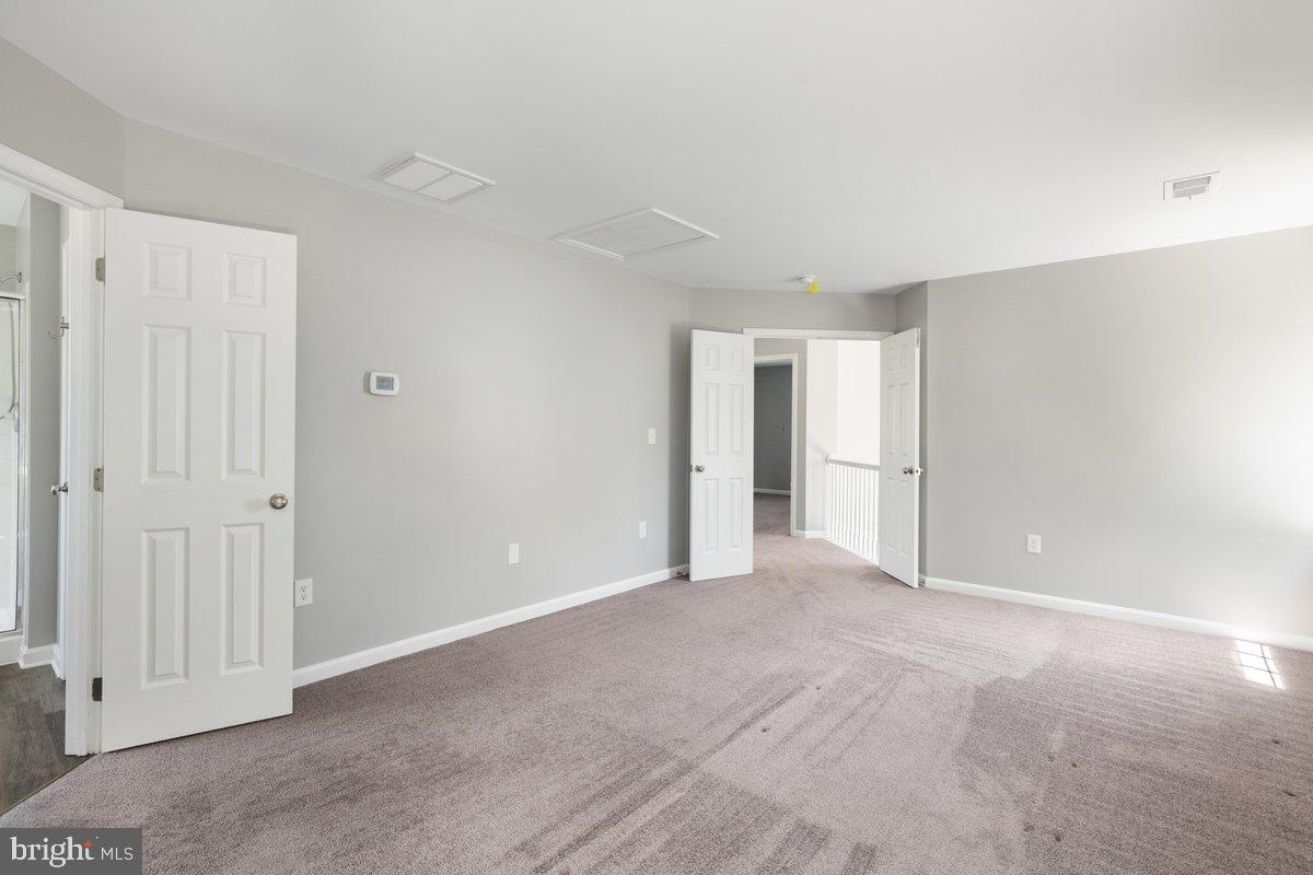 12 Glenbrook Road Ranson, WV 25438 - Photo 19 of 35 a view of an empty room and closet area