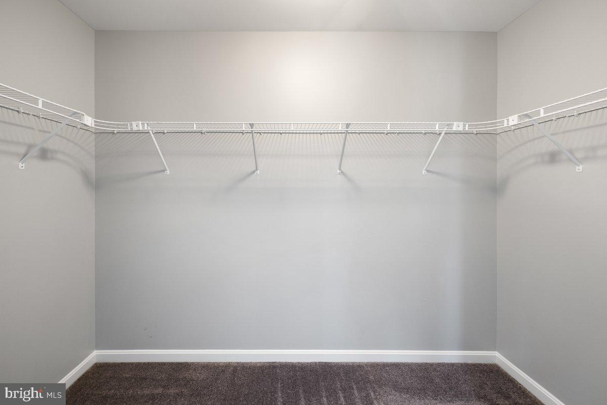 12 Glenbrook Road Ranson, WV 25438 - Photo 21 of 35 a view of a room with racks on the wall