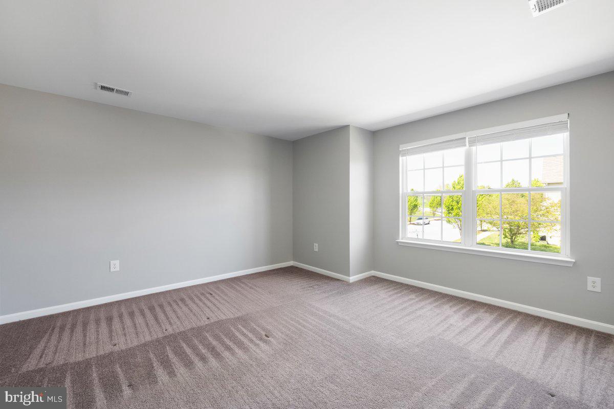 12 Glenbrook Road Ranson, WV 25438 - Photo 24 of 35 an empty room with windows