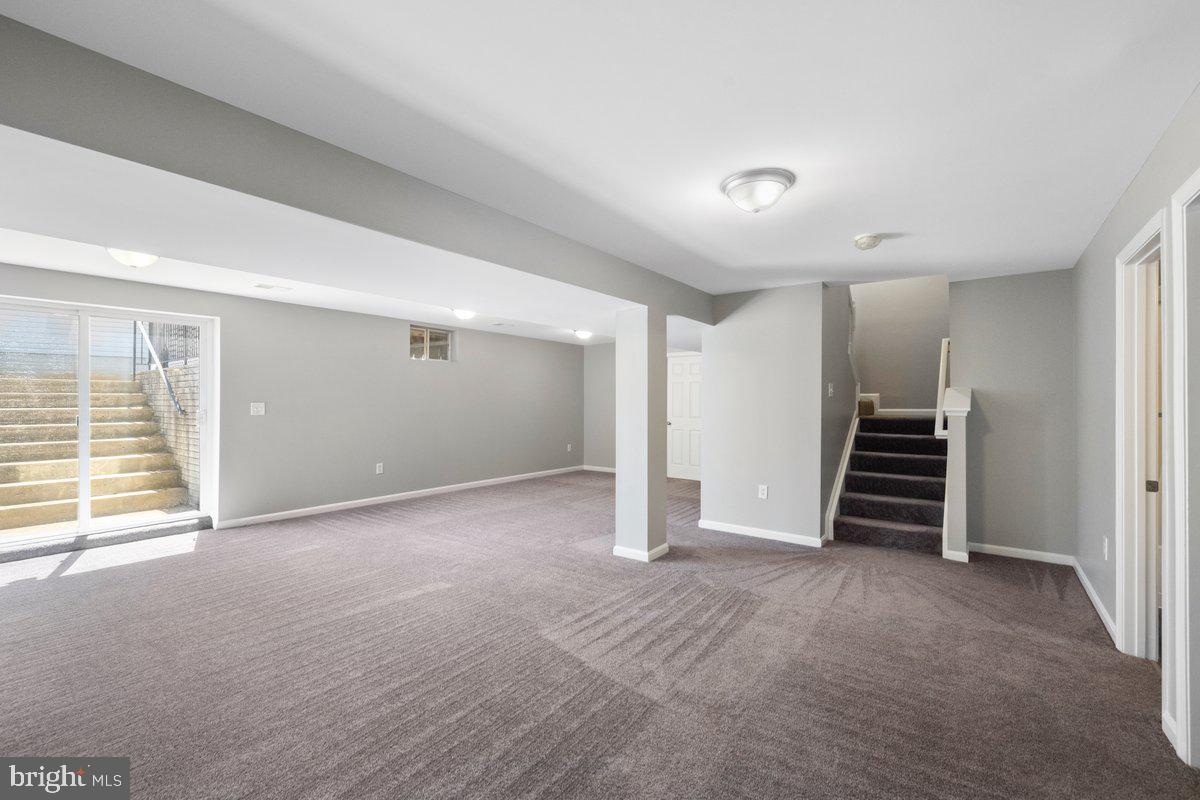 12 Glenbrook Road Ranson, WV 25438 - Photo 27 of 35 a view of an empty room with a fireplace
