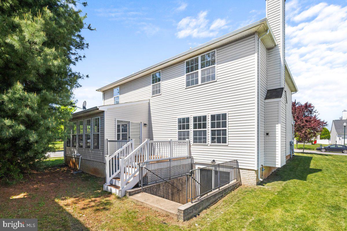 12 Glenbrook Road Ranson, WV 25438 - Photo 33 of 35 a view of house with backyard and sitting area
