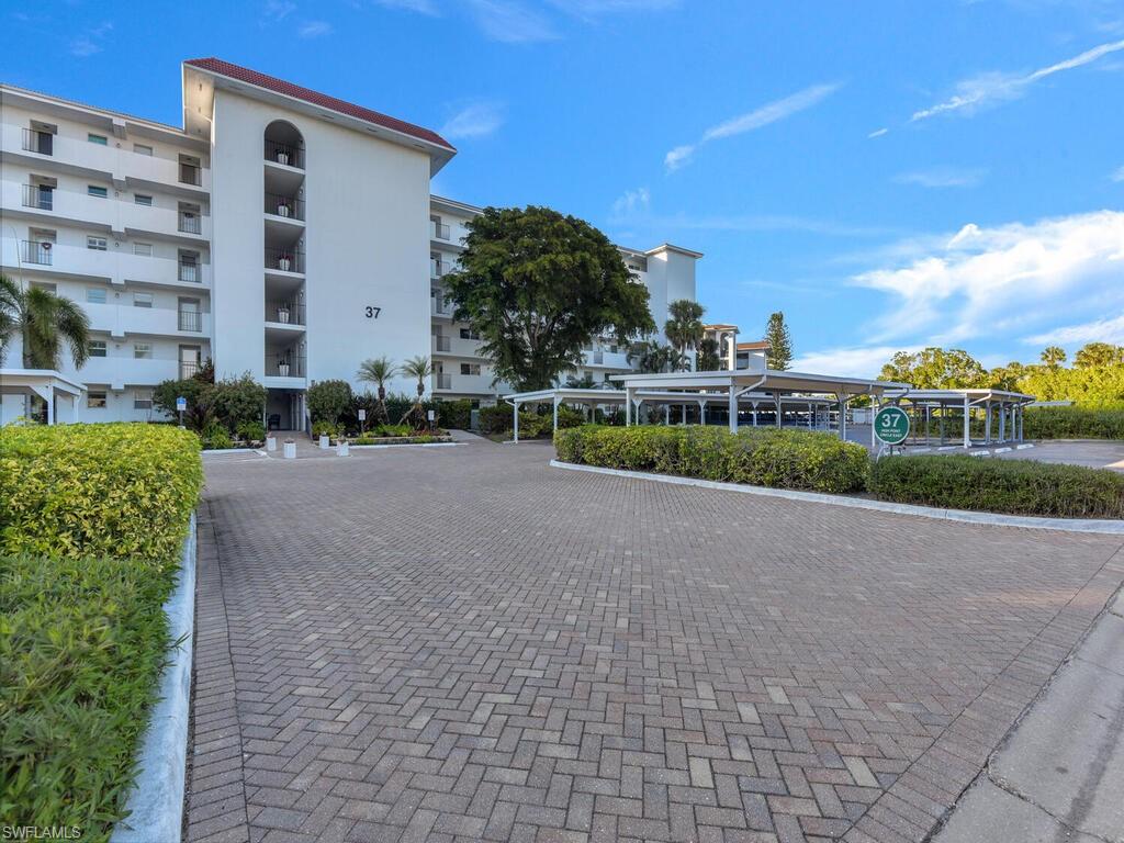 37 High Point Circle East, Unit 106 Naples, FL 34103 - Photo 1 of 23 View of property