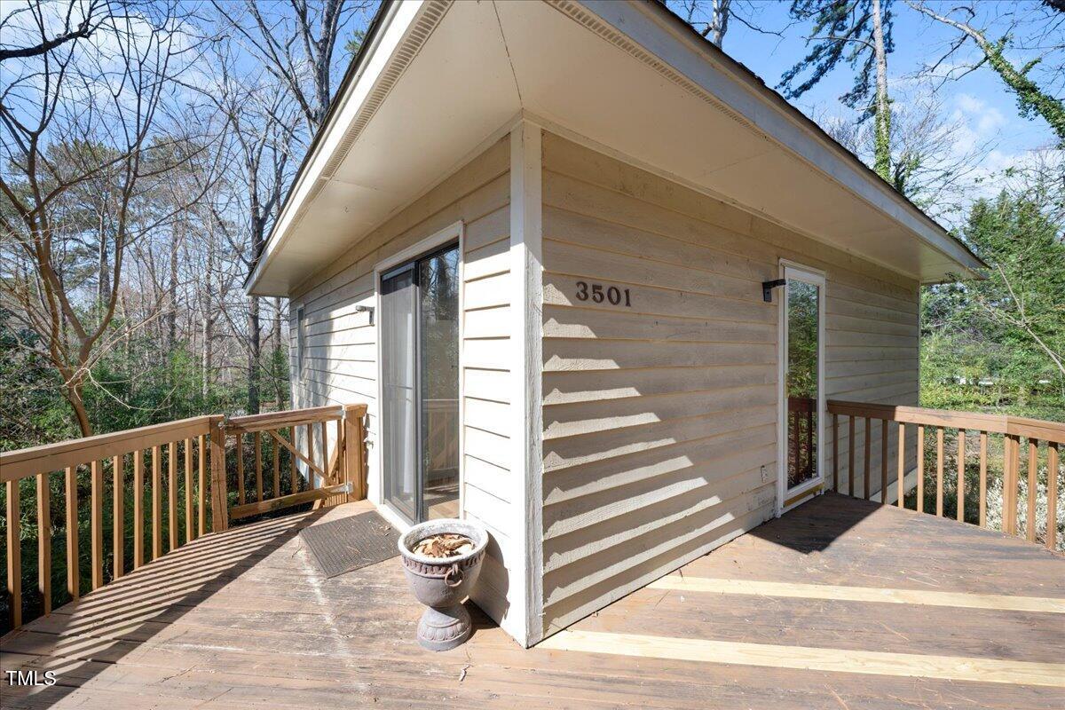3501 Mill Run Raleigh, NC 27612 - Photo 18 of 24 a view of a balcony with door