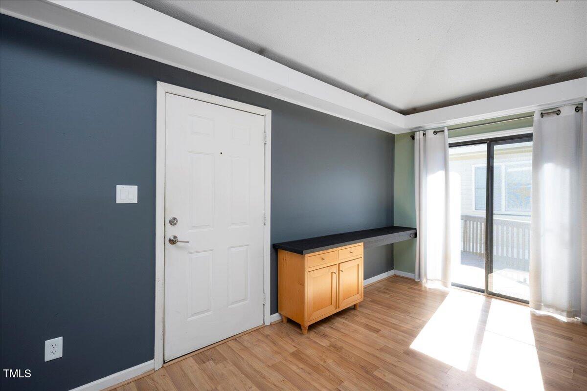 3501 Mill Run Raleigh, NC 27612 - Photo 4 of 24 wooden floor in an empty room
