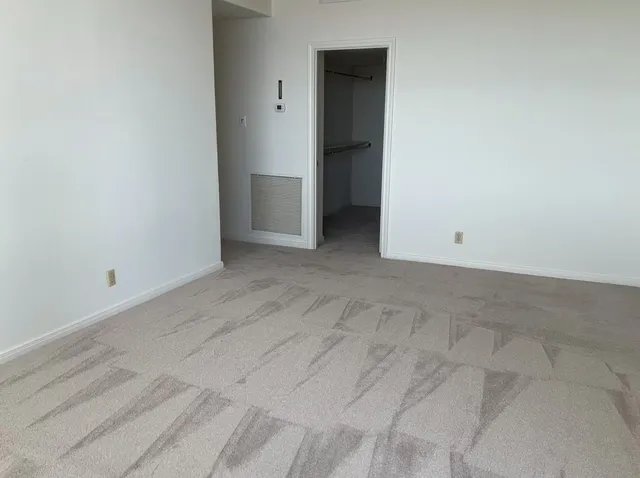 a view of a building with a swimming pool