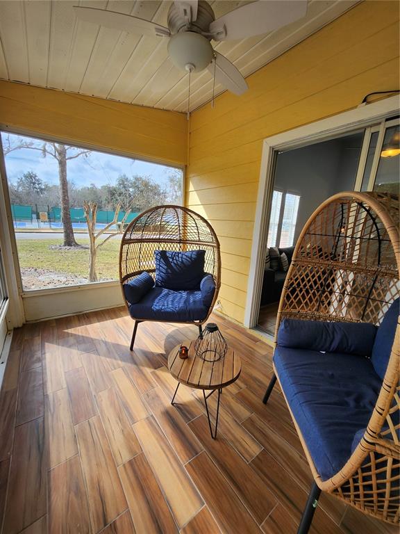 4801 Northwest 2nd Place Gainesville, FL 32607 - Photo 23 of 36 a living room with furniture and a large window