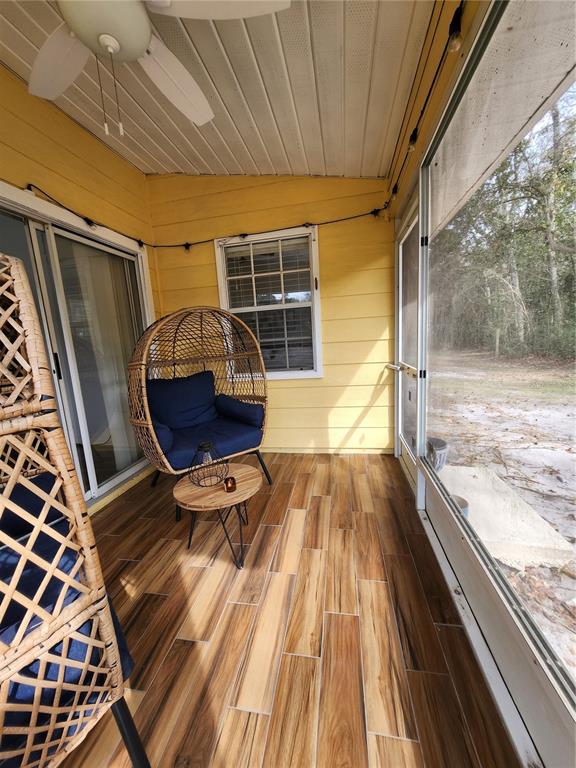 4801 Northwest 2nd Place Gainesville, FL 32607 - Photo 25 of 36 a view of balcony with wooden floor