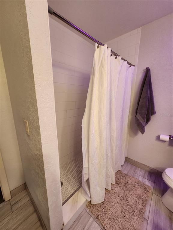 4801 Northwest 2nd Place Gainesville, FL 32607 - Photo 29 of 36 a view of walk in closet with clothes and shoes