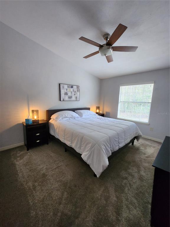 4801 Northwest 2nd Place Gainesville, FL 32607 - Photo 33 of 36 a bedroom with a bed and window