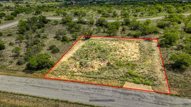 a view of a wooden floor with a yard