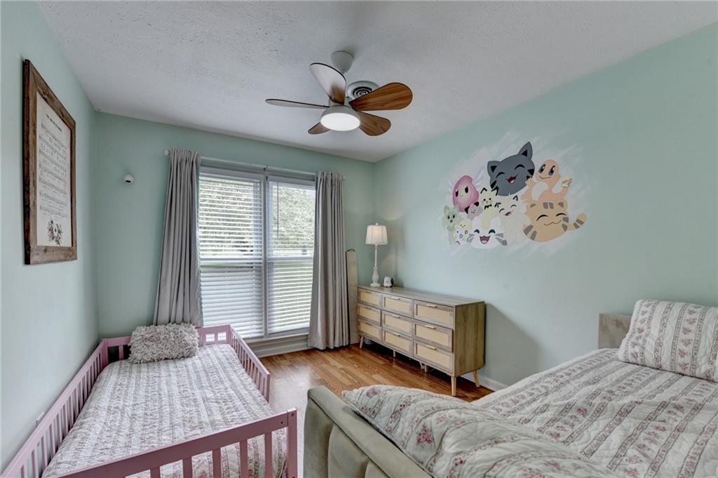 501 Wages Road Auburn, GA 30011 - Photo 25 of 50 a bedroom with a bed and a window