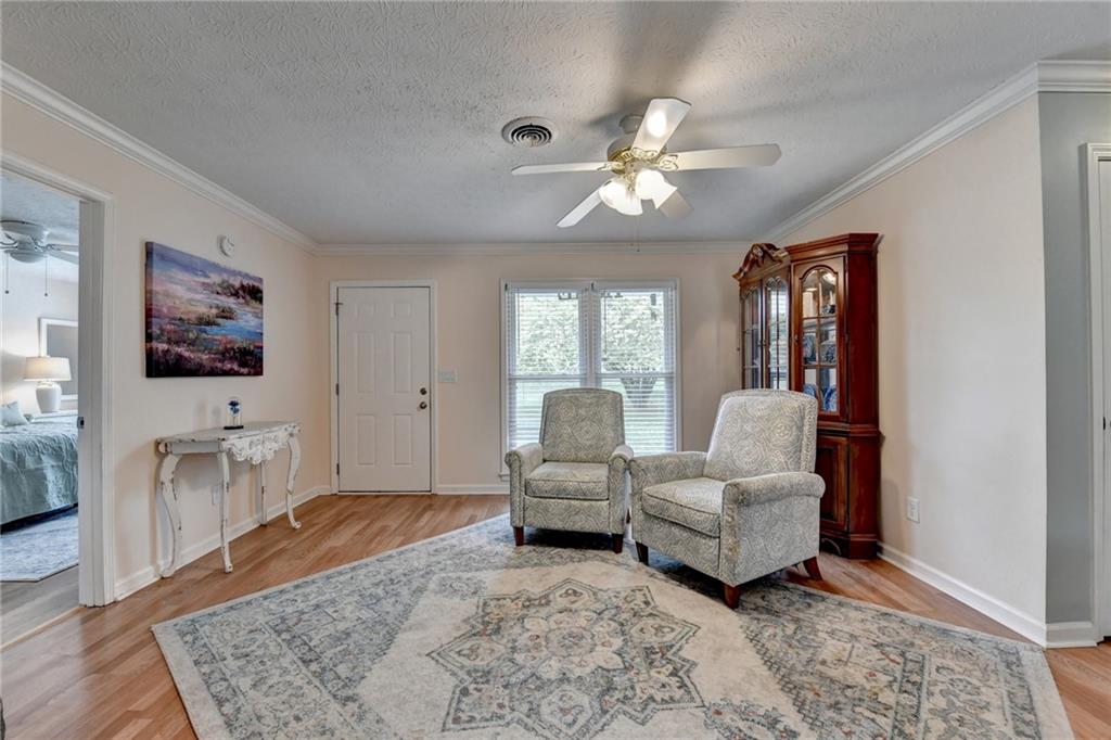 501 Wages Road Auburn, GA 30011 - Photo 10 of 50 a living room with furniture and a flat screen tv