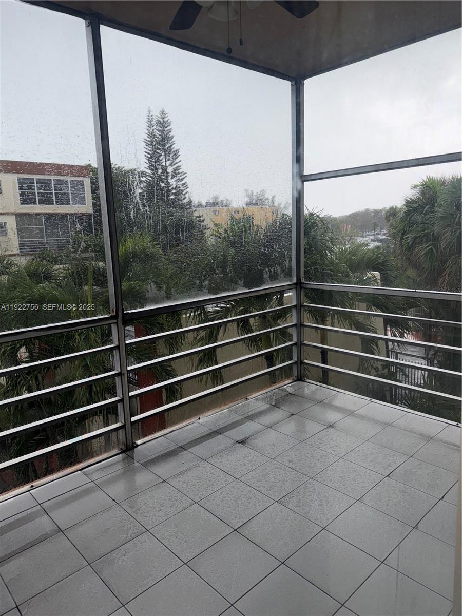 4042 Northwest 19th Street, Unit 305 Lauderhill, FL 33313 - Photo 3 of 8 a view of outdoor space with city view