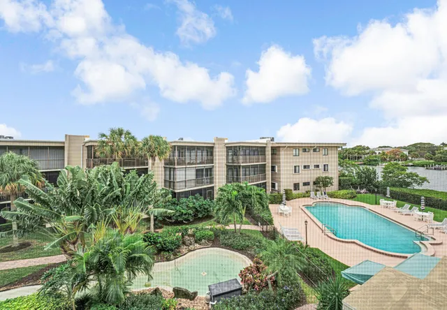 a view of a house with a swimming pool