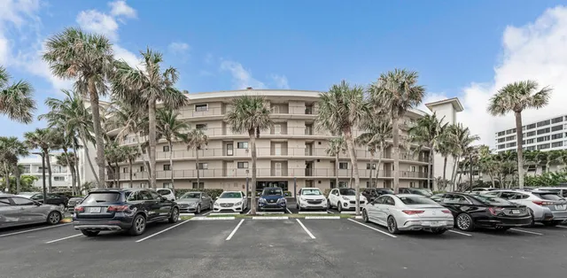 a view of a swimming pool with lounge chair