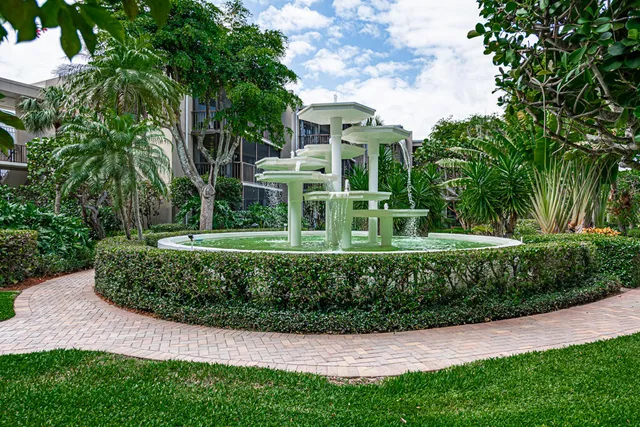 a view of a city and a garden