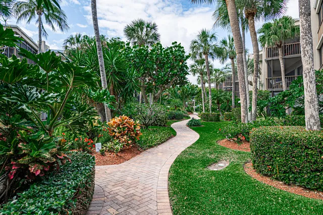 a view of a swimming pool with sitting area