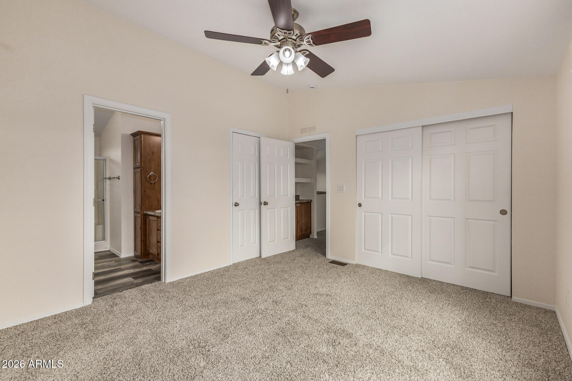 555 West Warner Road, Unit 55 Chandler, AZ 85225 - Photo 18 of 26 a view of an empty room with a ceiling fan