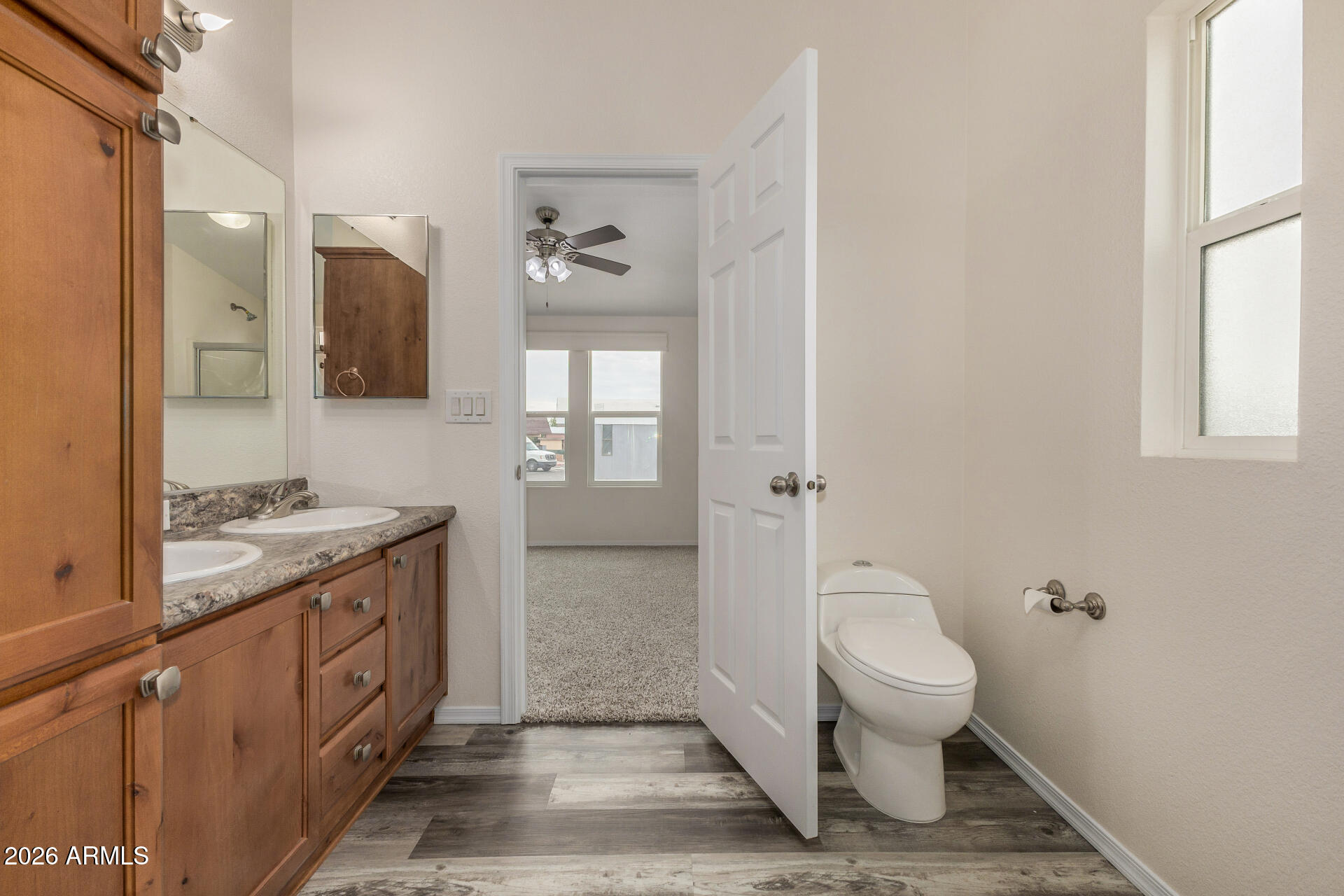 555 West Warner Road, Unit 55 Chandler, AZ 85225 - Photo 19 of 26 a spacious bathroom with a granite countertop sink a toilet and shower