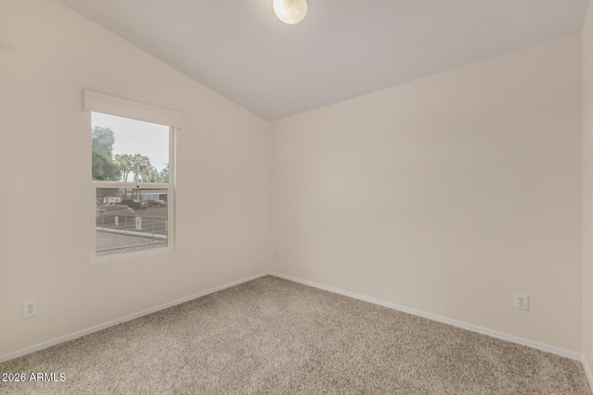 555 West Warner Road, Unit 55 Chandler, AZ 85225 - Photo 23 of 26 an empty room with a window