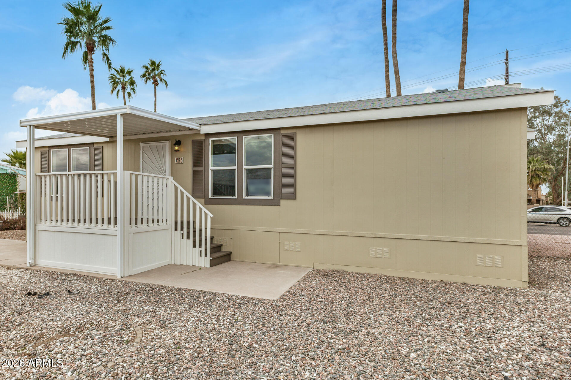 555 West Warner Road, Unit 55 Chandler, AZ 85225 - Photo 5 of 26 a view of a house with a balcony