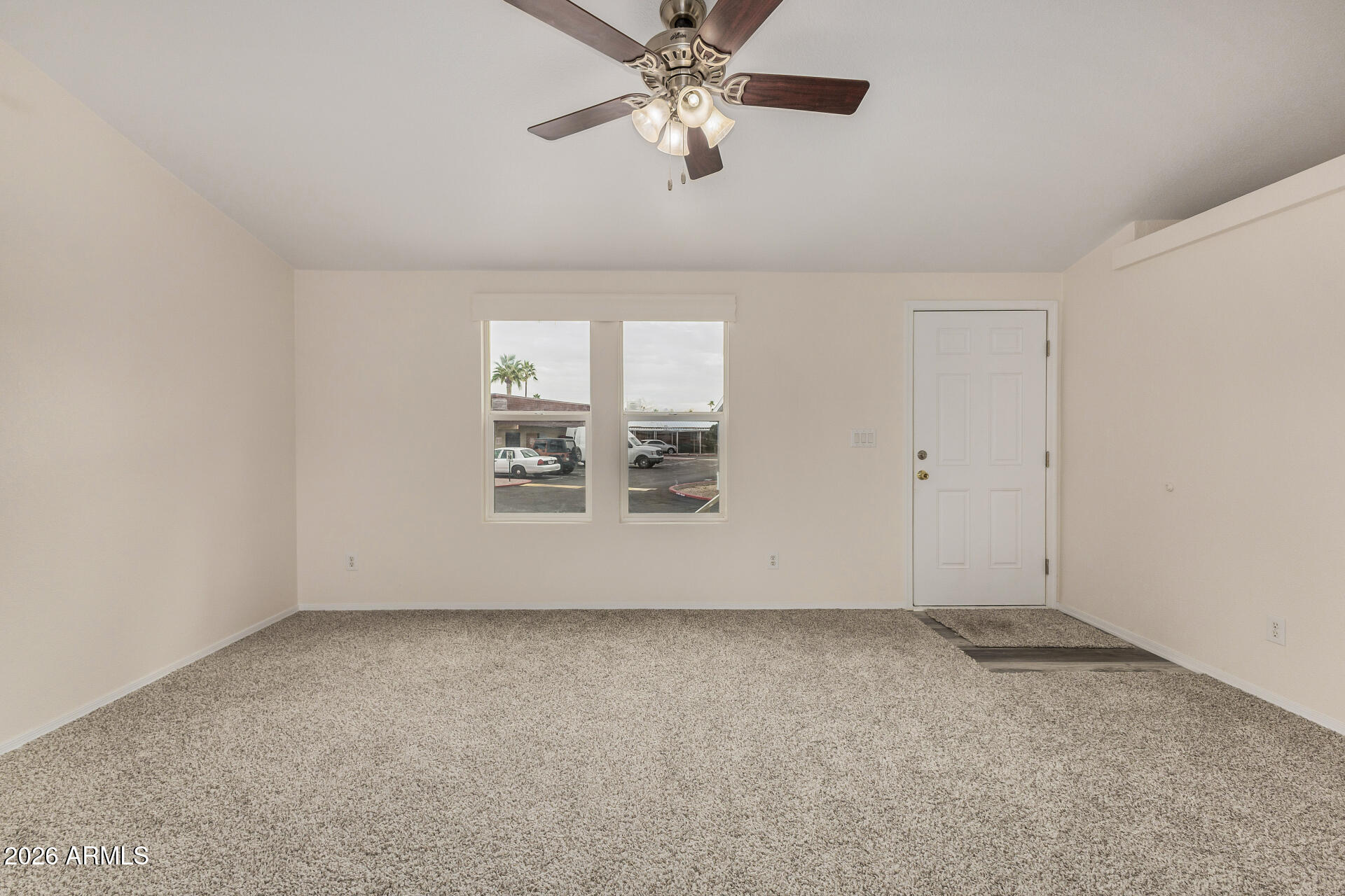 555 West Warner Road, Unit 55 Chandler, AZ 85225 - Photo 6 of 26 a view of an empty room with a window