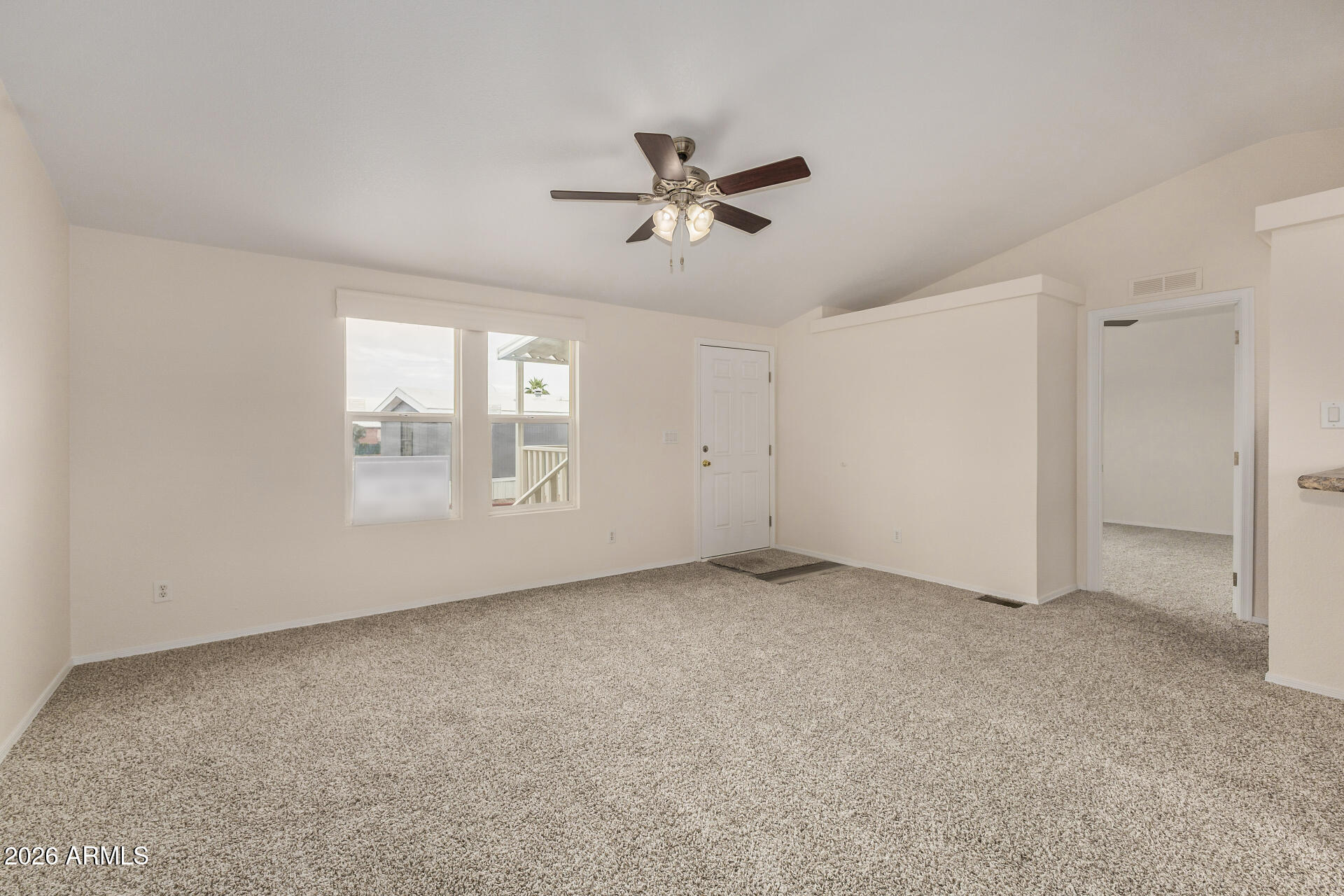 555 West Warner Road, Unit 55 Chandler, AZ 85225 - Photo 7 of 26 a view of an empty room with a window