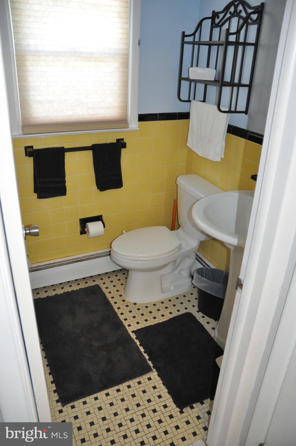 1112 Wynnbrook Road Secane, PA 19018 - Photo 11 of 14 a bathroom with a sink and a toilet
