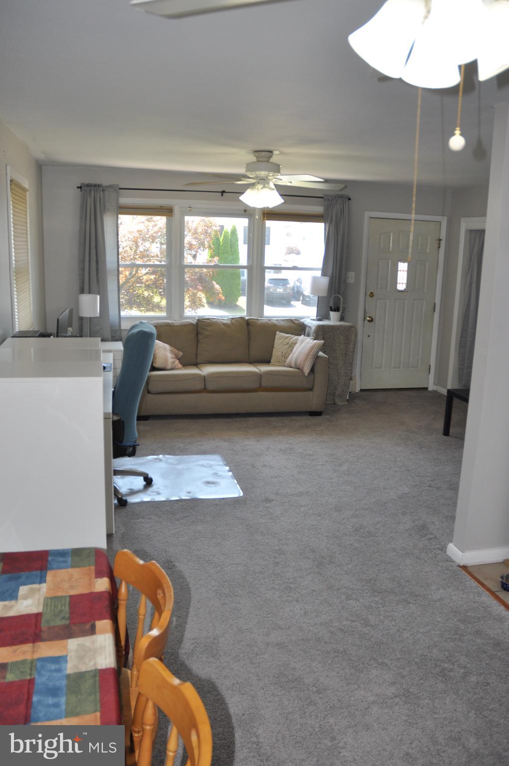 1112 Wynnbrook Road Secane, PA 19018 - Photo 3 of 14 a living room with furniture and a large window