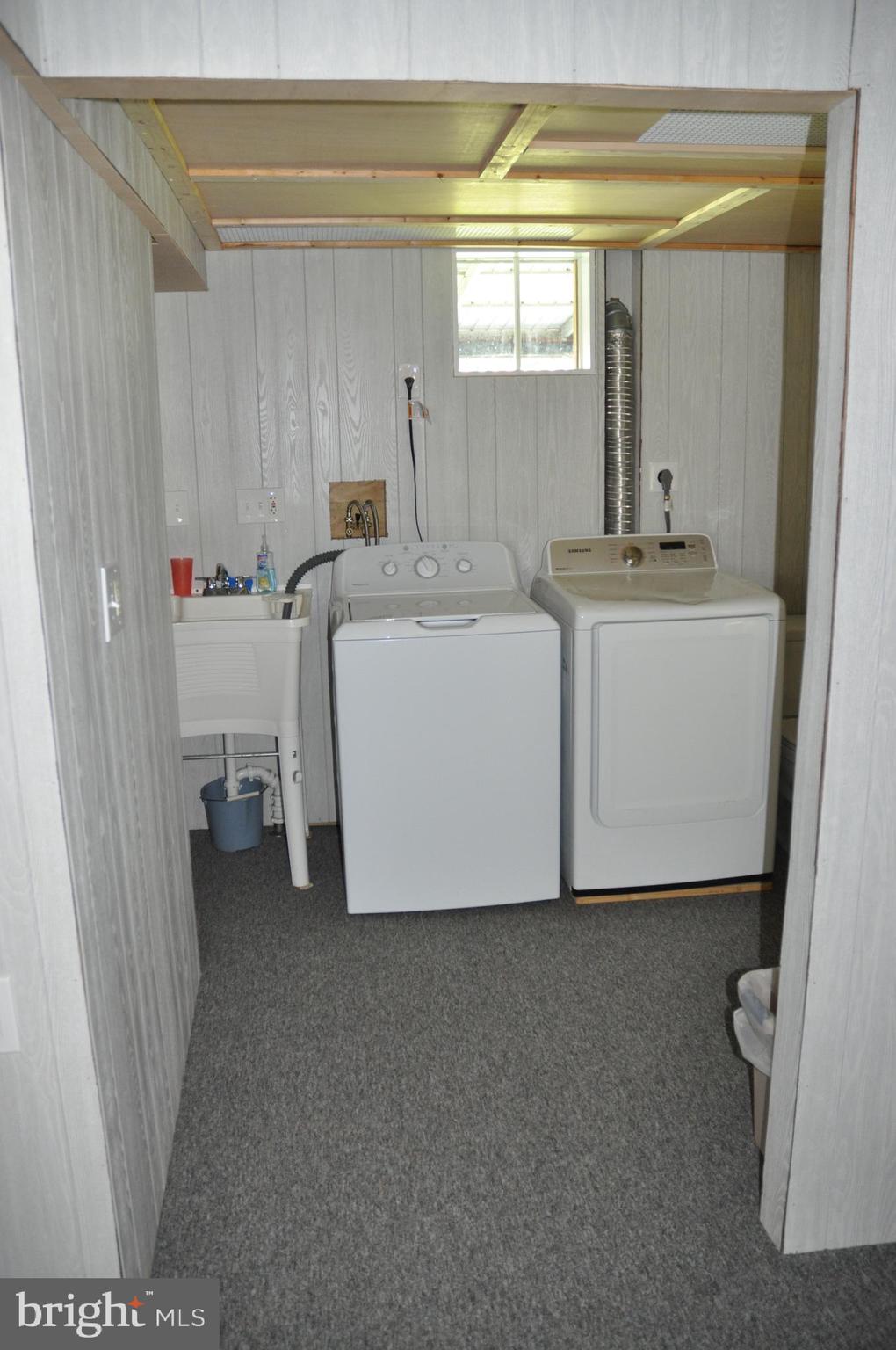 1112 Wynnbrook Road Secane, PA 19018 - Photo 7 of 14 a room with a sink and a mirror