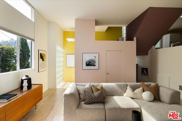 a living room with furniture and a couch