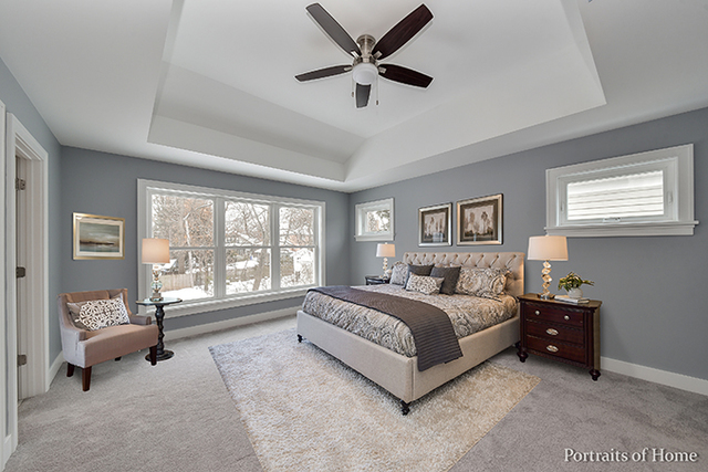 6340 Tennessee Avenue Willowbrook, IL 60527 - Photo 15 of 23 a spacious bedroom with a bed and a large window