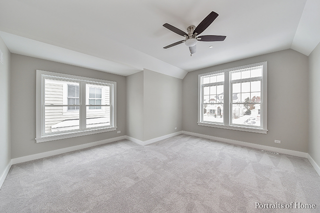 6340 Tennessee Avenue Willowbrook, IL 60527 - Photo 20 of 23 a view of a livingroom with a ceiling fan and window