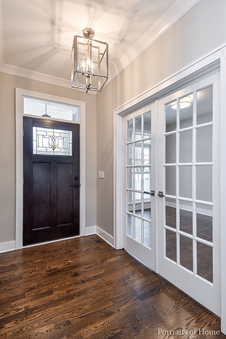 6340 Tennessee Avenue Willowbrook, IL 60527 - Photo 2 of 23 a view of a windows and a chandelier in a room