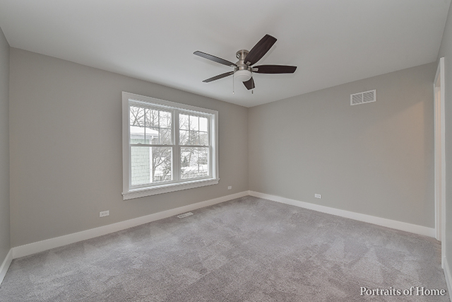 6340 Tennessee Avenue Willowbrook, IL 60527 - Photo 21 of 23 a view of an empty room with a window