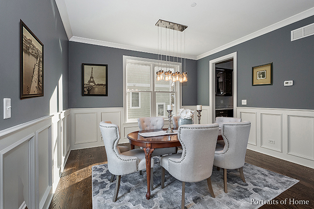 6340 Tennessee Avenue Willowbrook, IL 60527 - Photo 4 of 23 a view of a dining room with furniture window and wooden floor