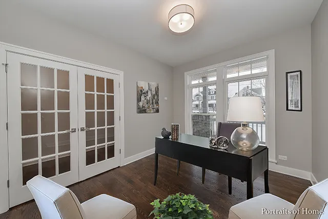a view of a livingroom with furniture and a window