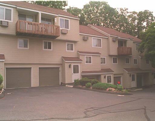 110 Coalpit Hill Road, Unit B8 Danbury, CT 06810 - Photo 1 of 1 a front view of a house with a garage
