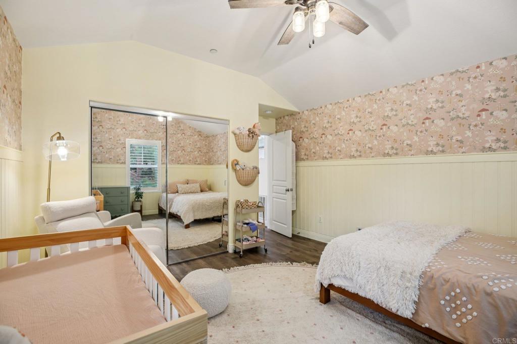 94 Hinterland Way Ladera Ranch, CA 92694 - Photo 14 of 52 a bedroom with a bed couch and window