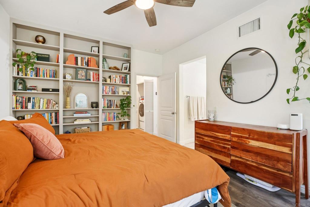 94 Hinterland Way Ladera Ranch, CA 92694 - Photo 18 of 52 a bedroom with bed and a bookshelf