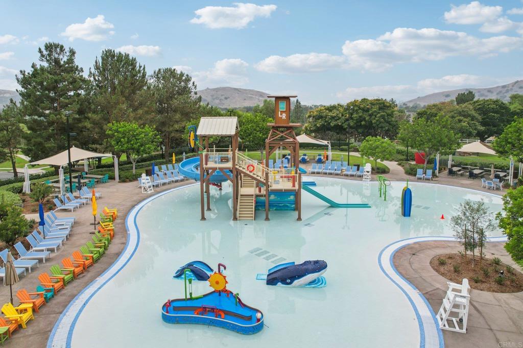 94 Hinterland Way Ladera Ranch, CA 92694 - Photo 47 of 52 a swimming pool with outdoor seating and city view