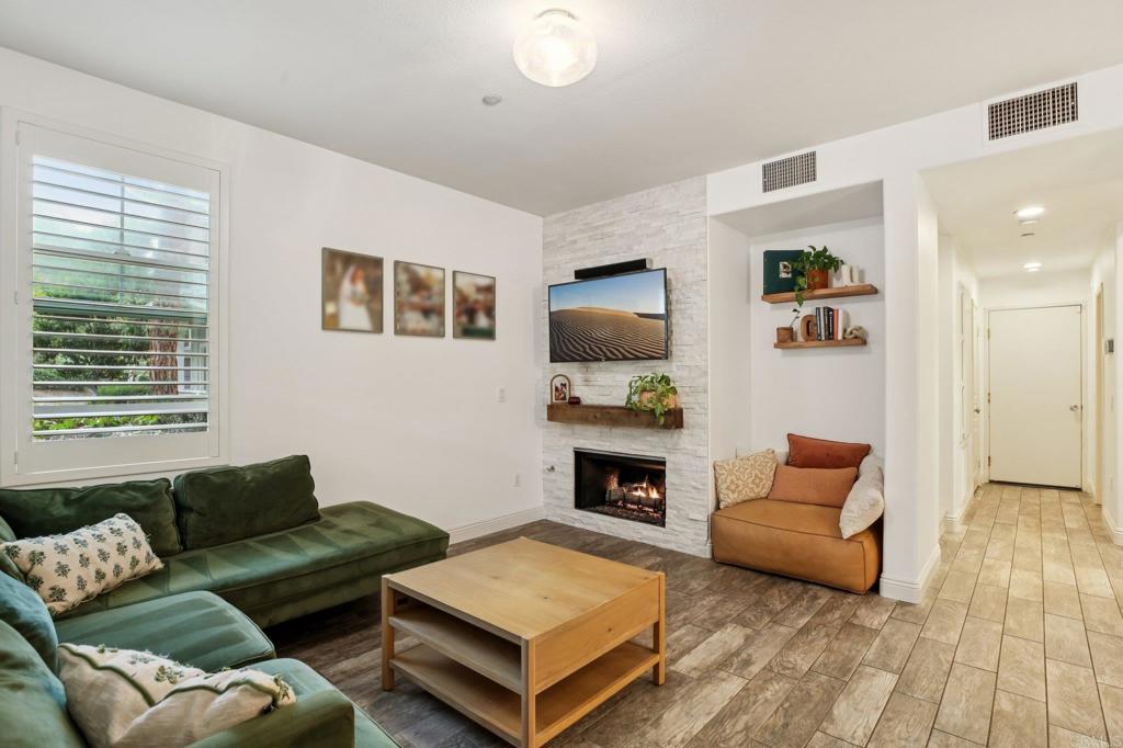 94 Hinterland Way Ladera Ranch, CA 92694 - Photo 5 of 52 a living room with furniture and a fireplace