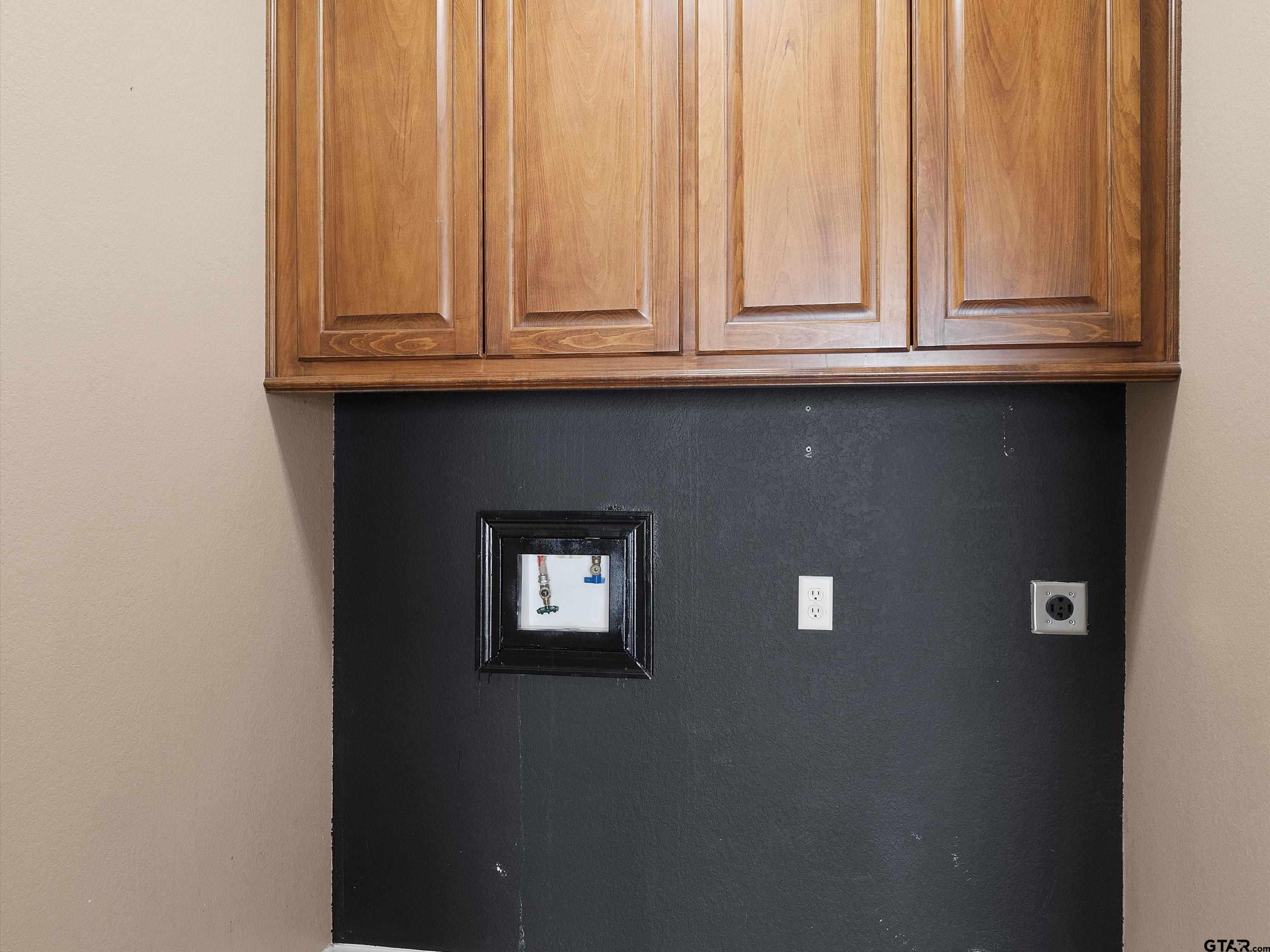 1703 Azalea Street Gilmer, TX 75644 - Photo 26 of 34 a view of a door with a sink