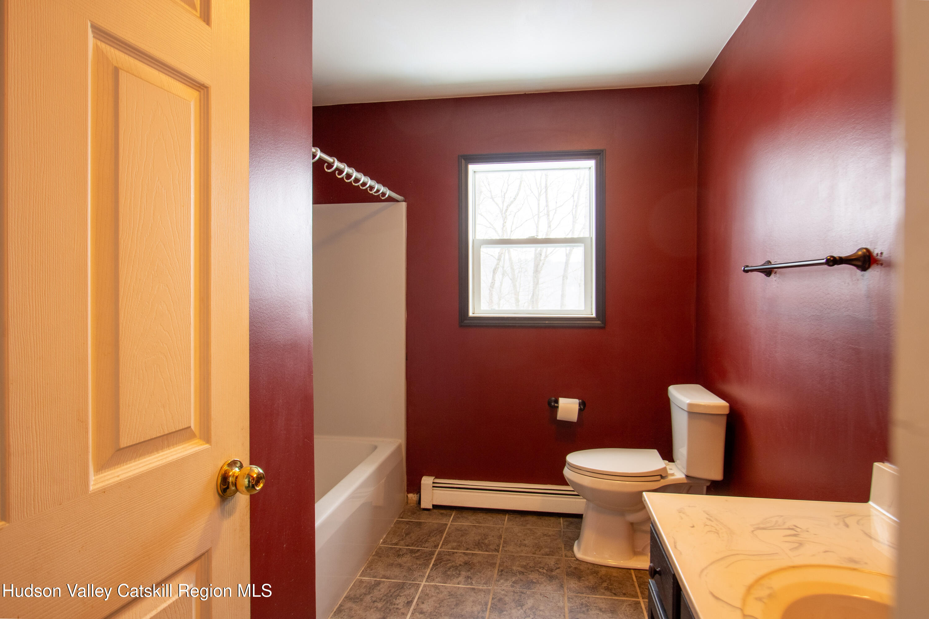 521 White Mills Road Valatie, NY 12184 - Photo 14 of 17 a bathroom with a toilet a sink and shower