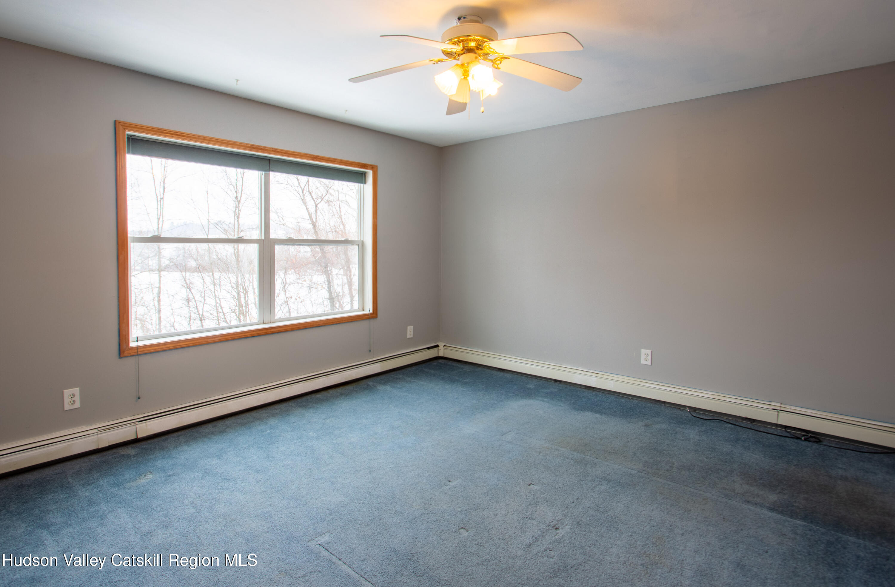 521 White Mills Road Valatie, NY 12184 - Photo 15 of 17 an empty room with a window