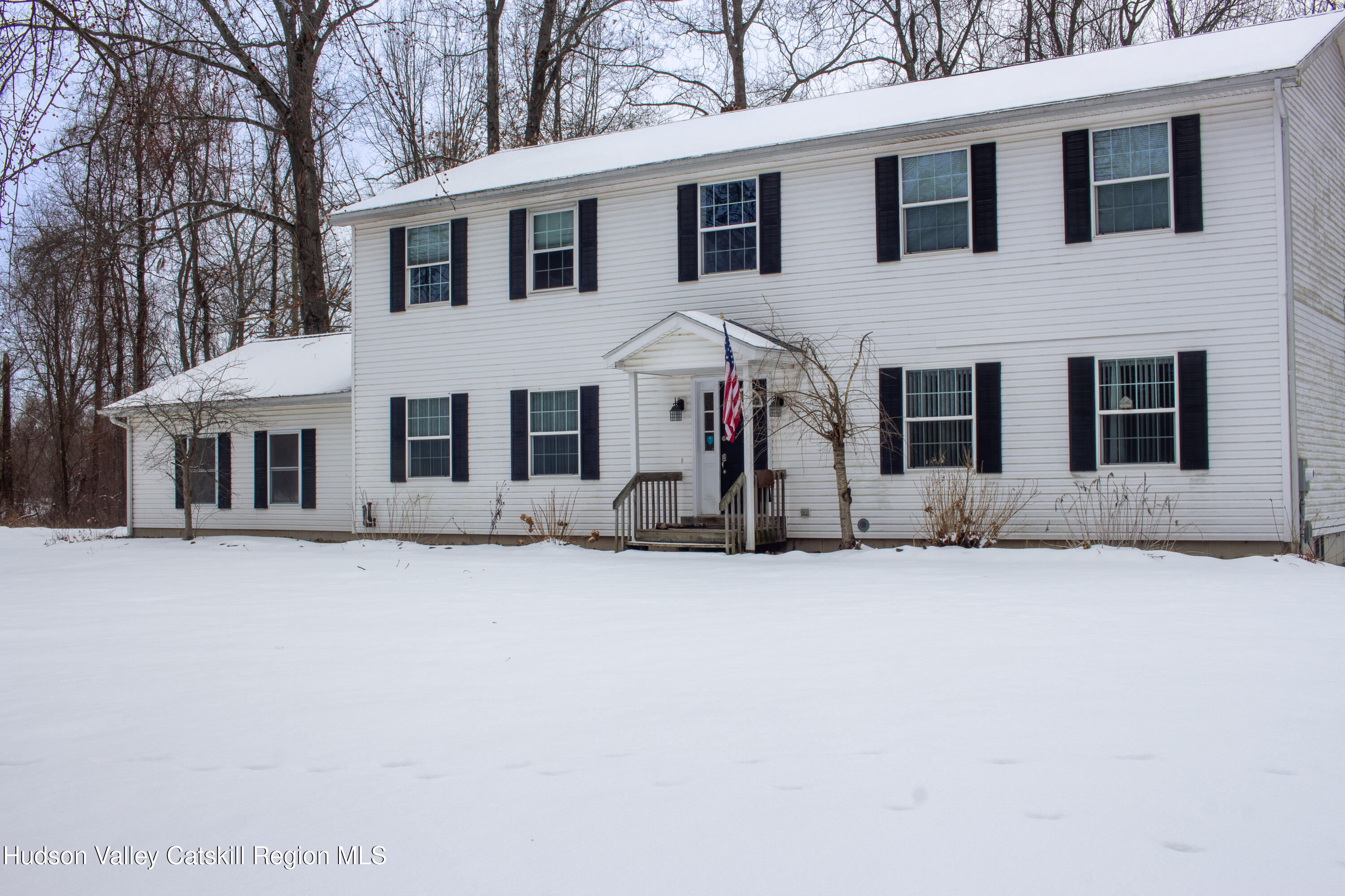 521 White Mills Road Valatie, NY 12184 - Photo 2 of 17 a front view of a house with a yard