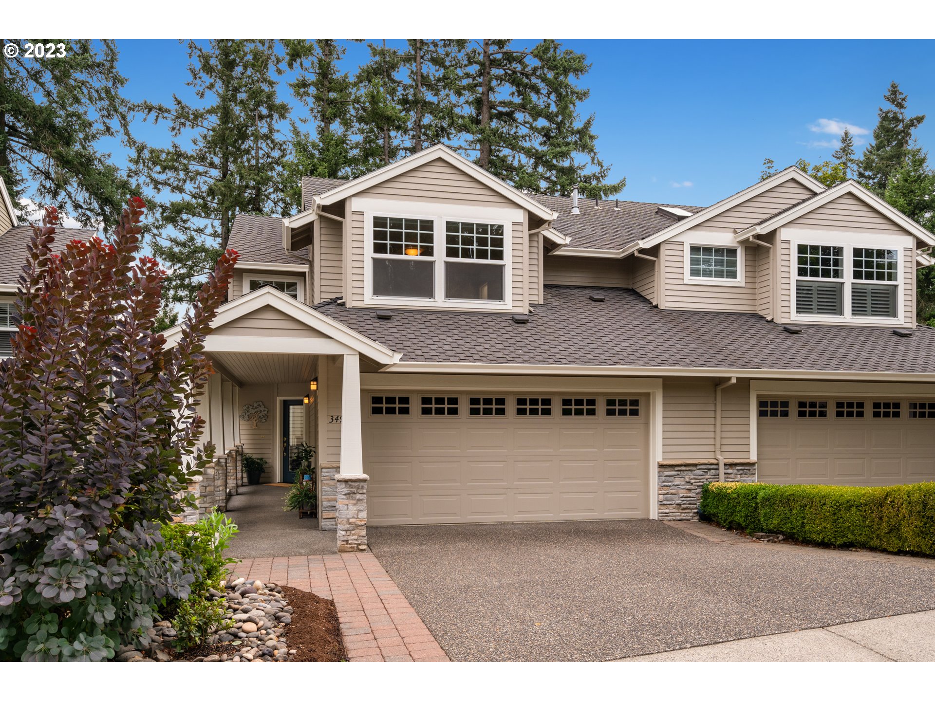 3490 Chaparrel Loop West Linn, OR 97068 - Photo 1 of 35 a front view of a house with a yard and garage